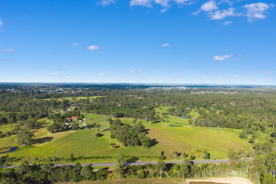 Aerial over the green acreage surrounding Eatonvale Meadows